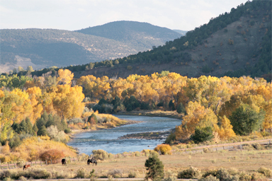 Fenn Books mountains and river in fall